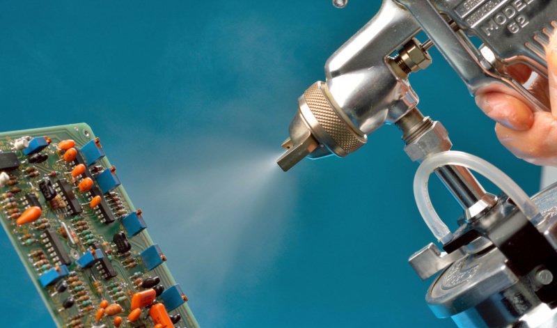 Conformal coating spray application on circuit board